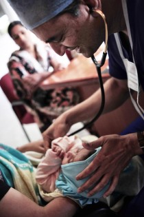 dr shetty examines a baby who has a heart defect